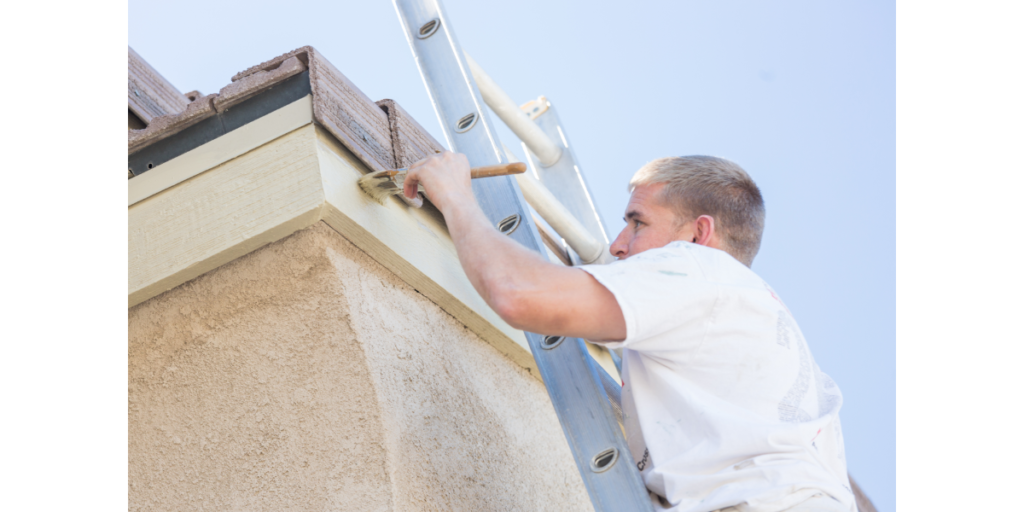 house painter on ladder